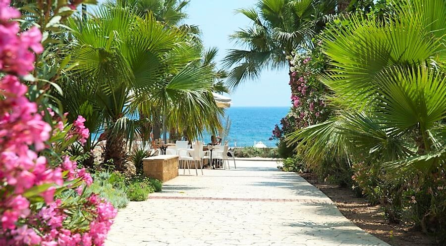 akti beach village resort walkway