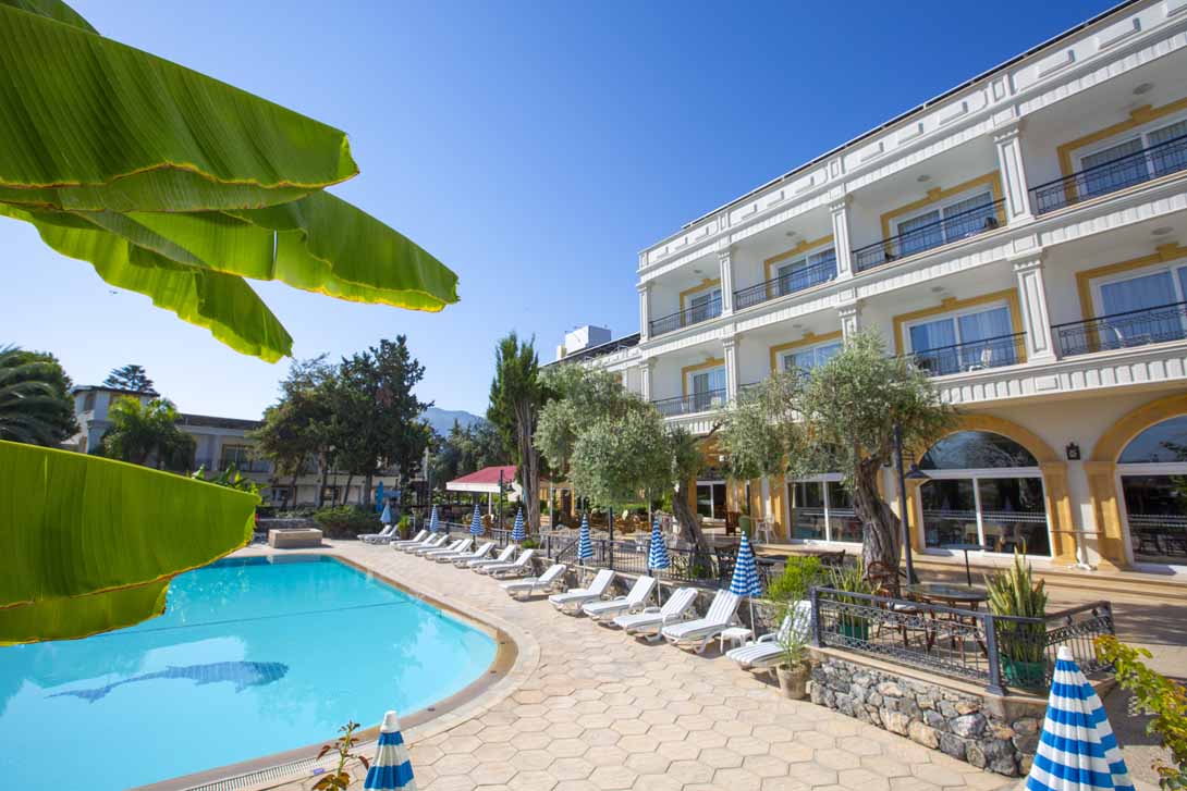 15 altinkaya hotel sunbeds poolside hotel view.jpg