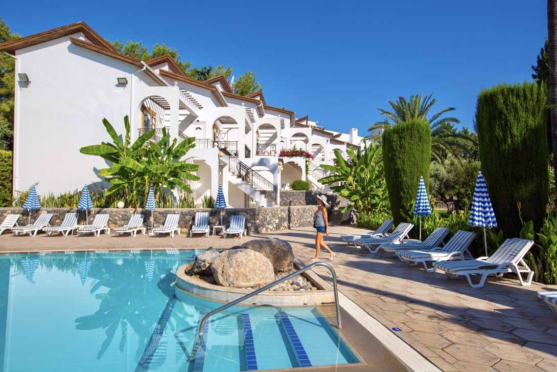 13-altinkaya-hotel-sunbeds-poolside-bungalow-view.jpeg