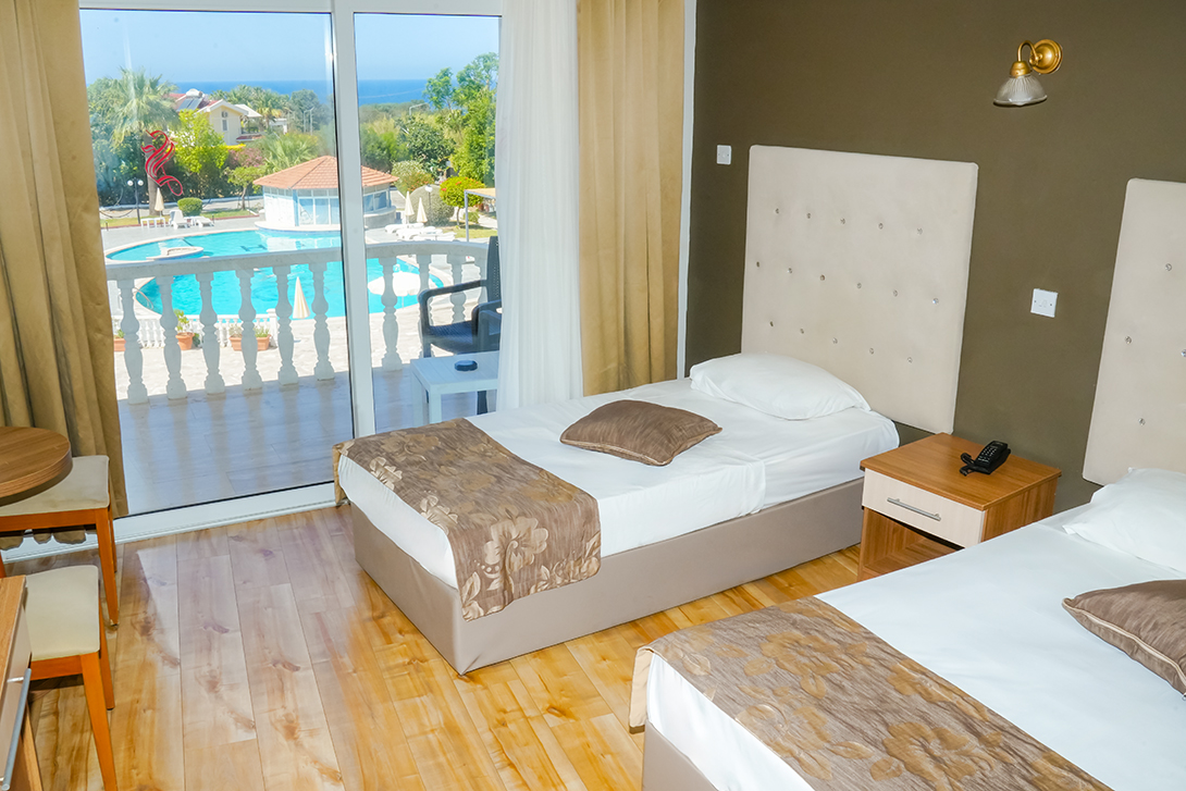 59-sempati-hotel-bedroom-with-poolview-Kyrenia